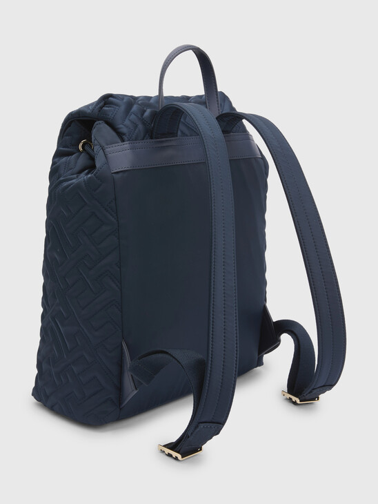 TH MONOGRAM QUILTED FLAP BACKPACK